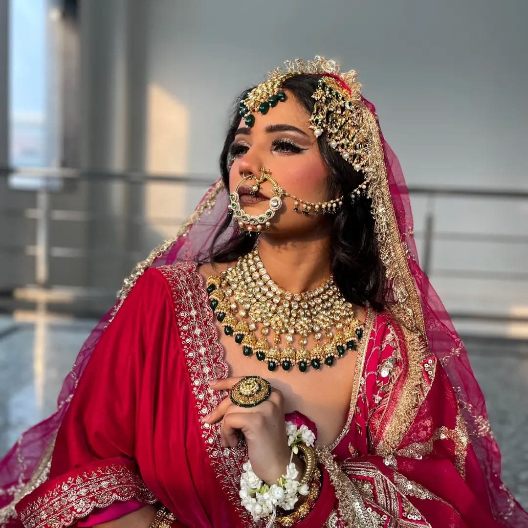 Evening portrait in a silver embellished gown with soft waves, diamond jewelry, and refined glam makeup